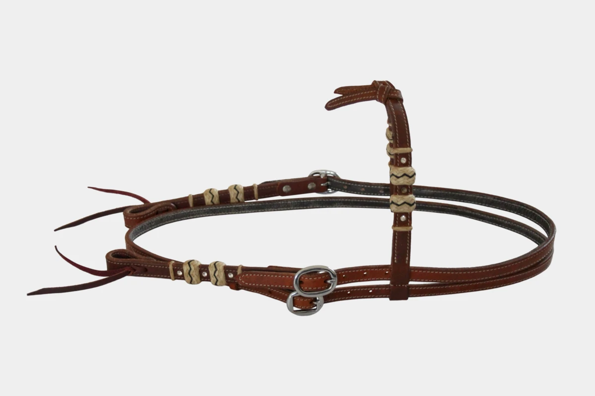 Cattlemans, GVR - Knotenstirnband rawhide crystal white mit Lederbändchen, Westerntrense, Quarter Horse, sadesa leather, leder, browband, Strasssteine, weiß, rouhaut, harness Cattlemans, GVR - Knotenstirnband rawhide crystal white mit Lederbändchen, Westerntrense, Quarter Horse, sadesa leather, leder, browband, Strasssteine, weiß, rouhaut, harness